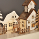 LED vánoční vesnička, 34x17cm, dřevo, 4 LED, 2x AA